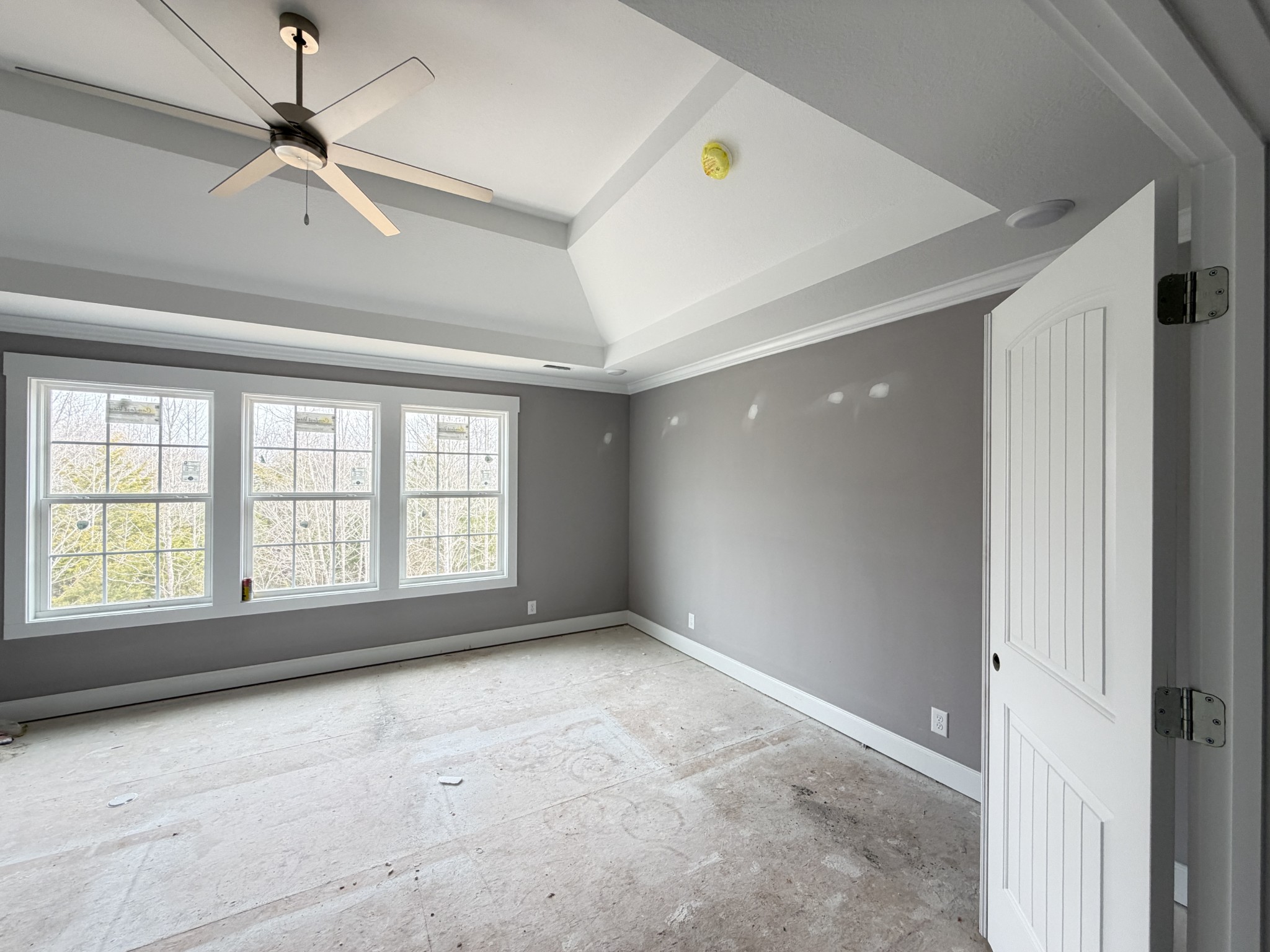 124 Hummingbird Way Clarksville, TN 37043 - Photo 7 of 12 a view of an empty room with a window
