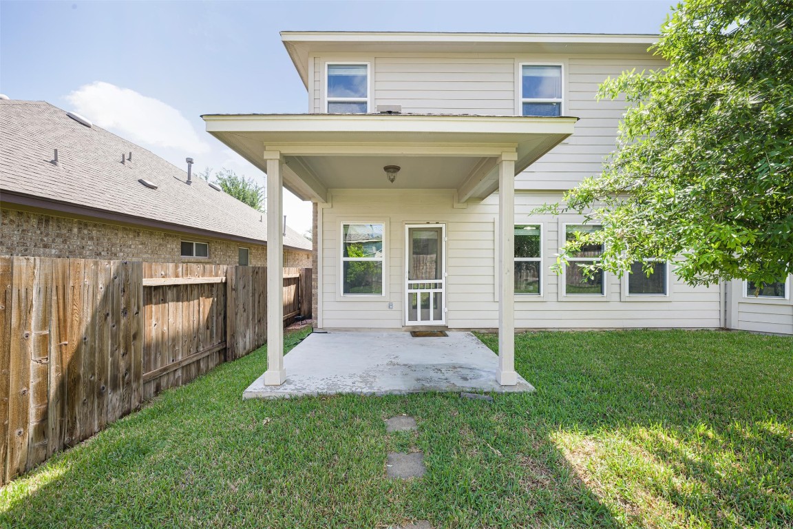 1812 Hidden Springs Path Round Rock, TX 78665 - Photo 37 of 39 a view of a house with backyard porch and sitting area
