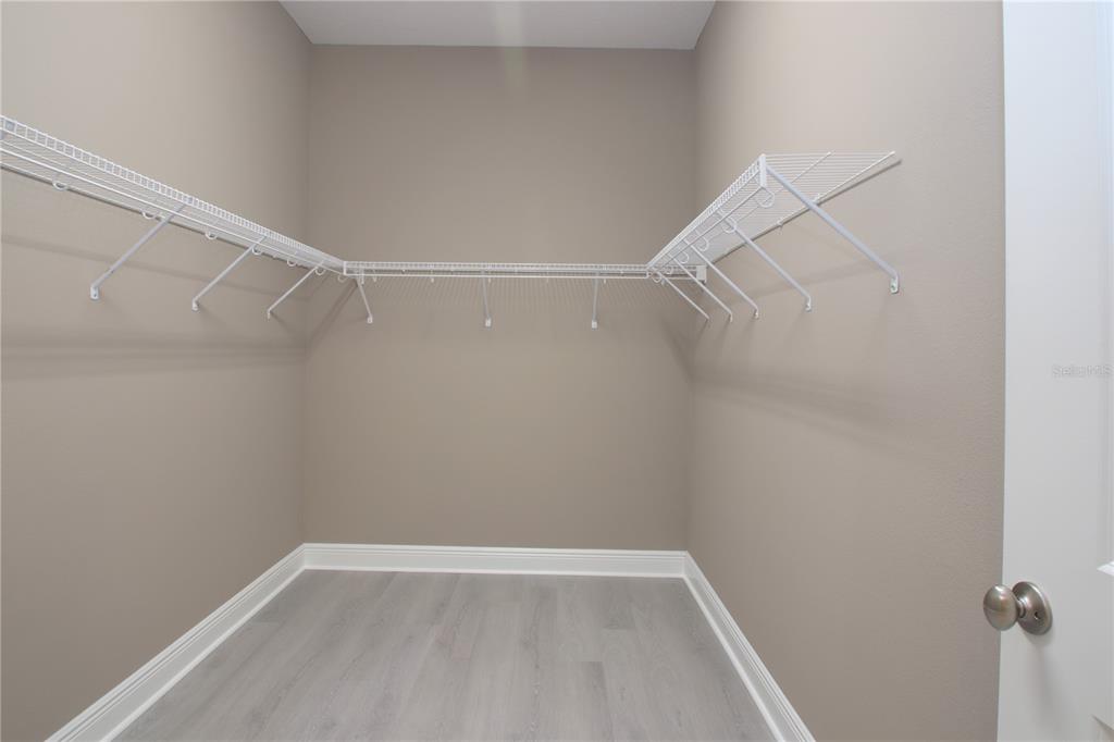 1427 Lake Florence Way Winter Park, FL 32792 - Photo 18 of 32 a view of a room with racks on the wall
