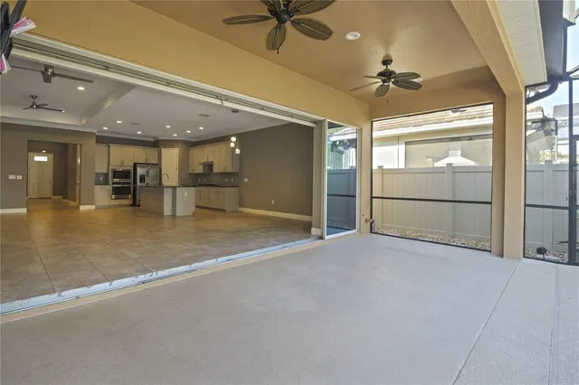 a view of a swimming pool with a patio