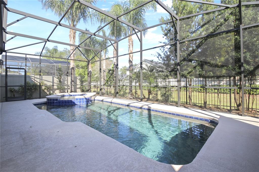 1427 Lake Florence Way Winter Park, FL 32792 - Photo 22 of 32 a view of a swimming pool with a patio