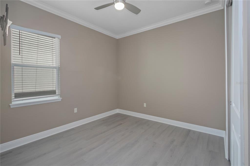 1427 Lake Florence Way Winter Park, FL 32792 - Photo 25 of 32 an empty room with a window