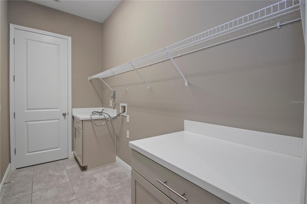 1427 Lake Florence Way Winter Park, FL 32792 - Photo 29 of 32 a utility room with dryer and washer
