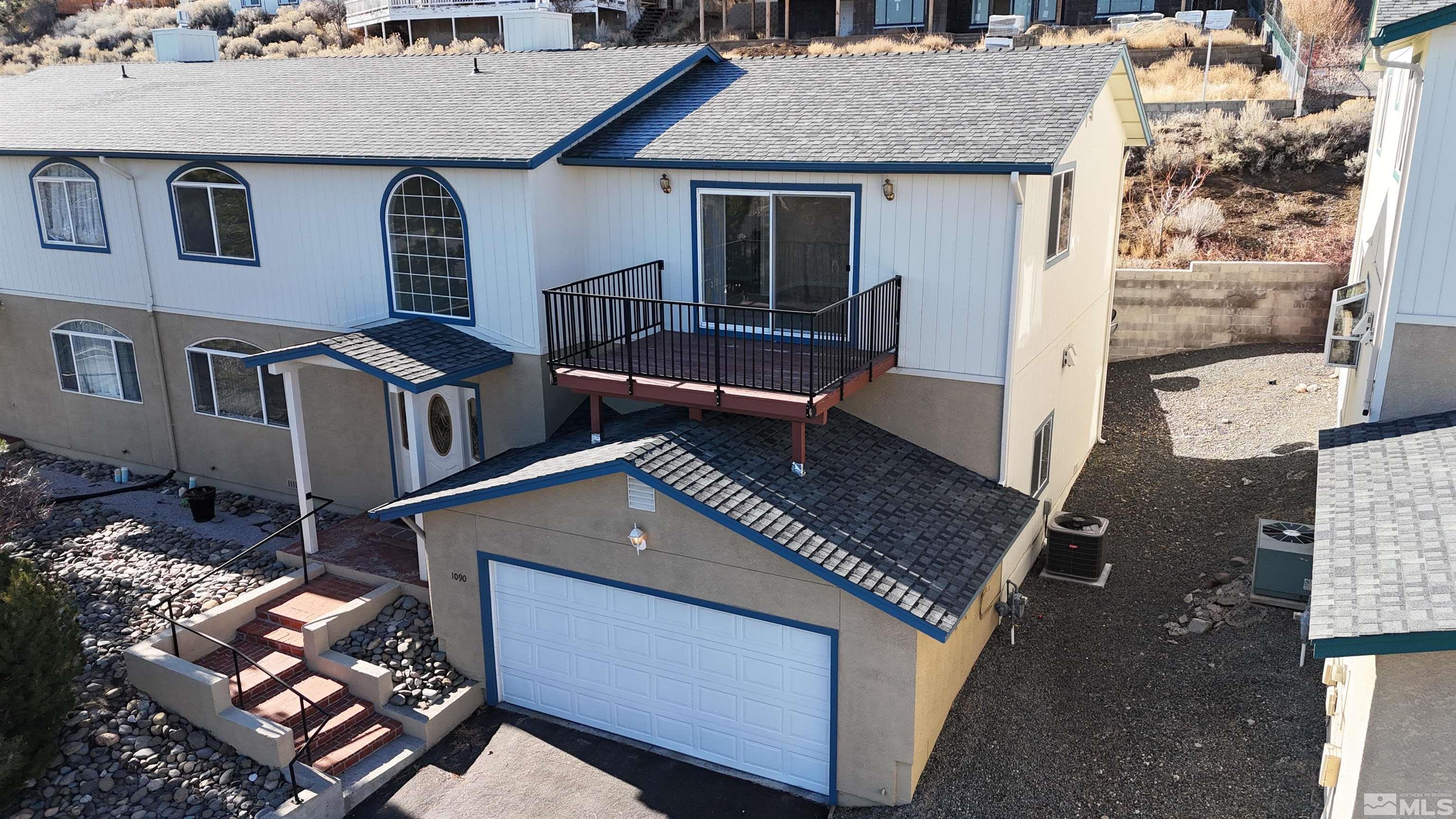 an aerial view of a house with balcony