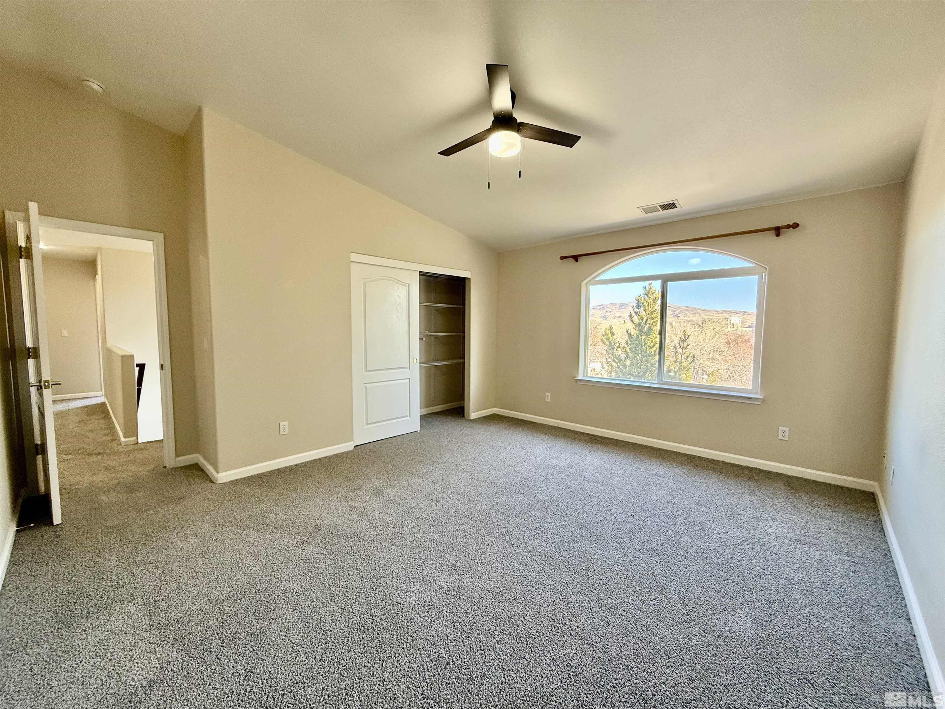 1090 Spring Drive Carson City, NV 89703 - Photo 15 of 31 a view of an empty room with a window