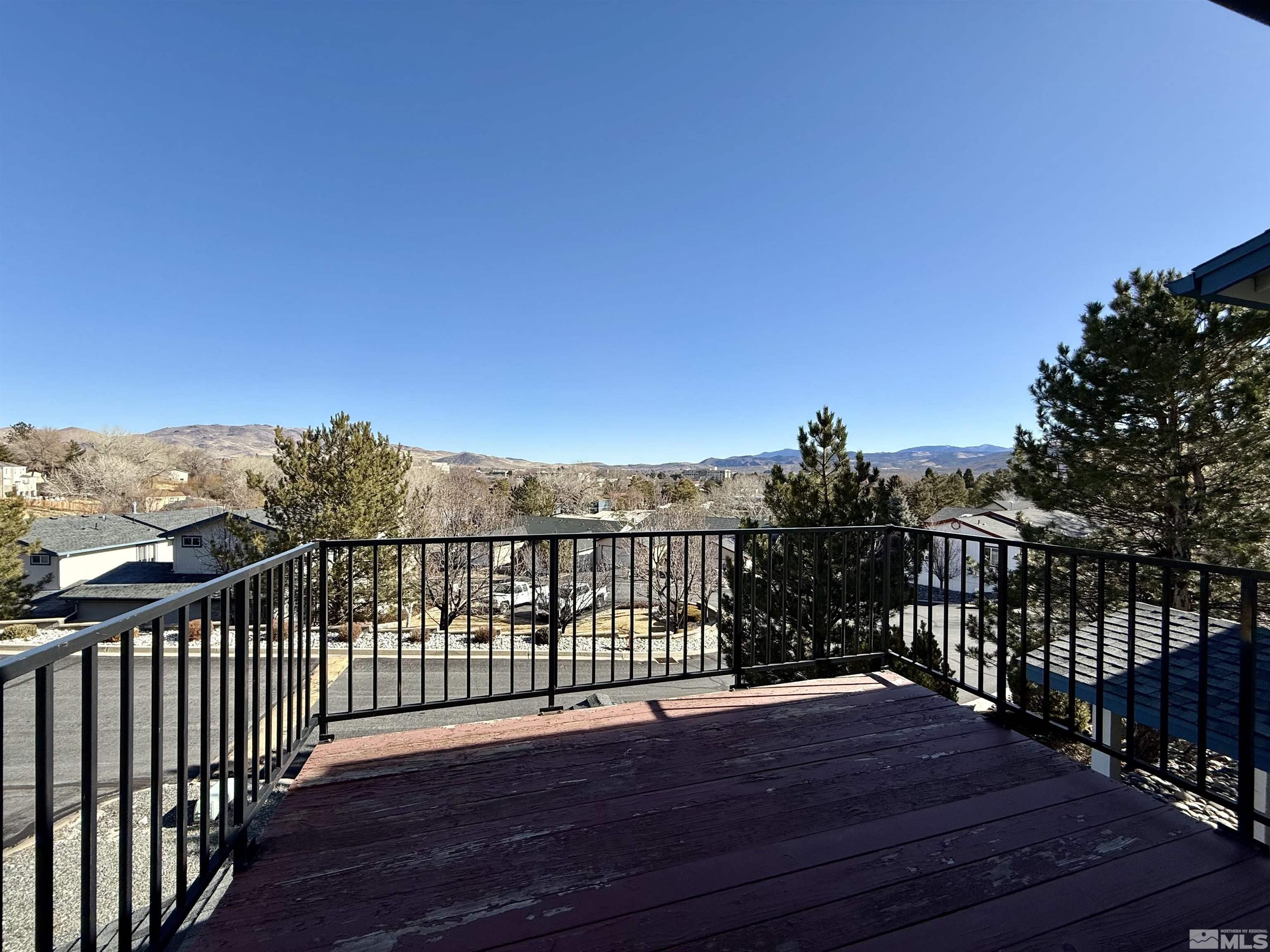 1090 Spring Drive Carson City, NV 89703 - Photo 25 of 31 a view of a balcony with wooden floor