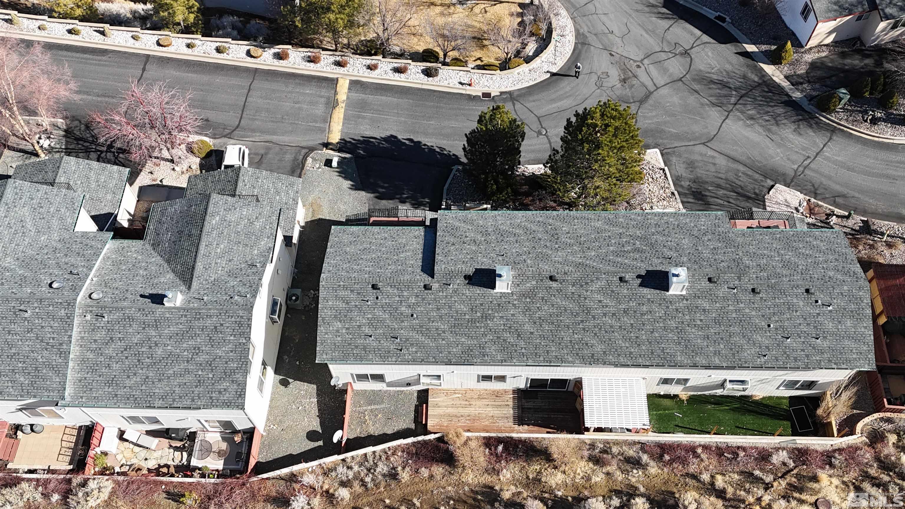 1090 Spring Drive Carson City, NV 89703 - Photo 31 of 31 an aerial view of a house with a yard