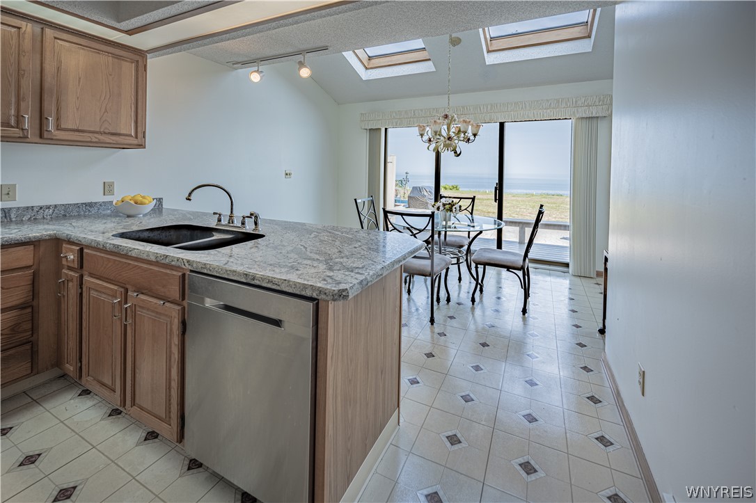 6071 East Lake Road, Unit 4 Newfane, NY 14028 - Photo 13 of 46 Kitchen, eating area, skylights and more views of