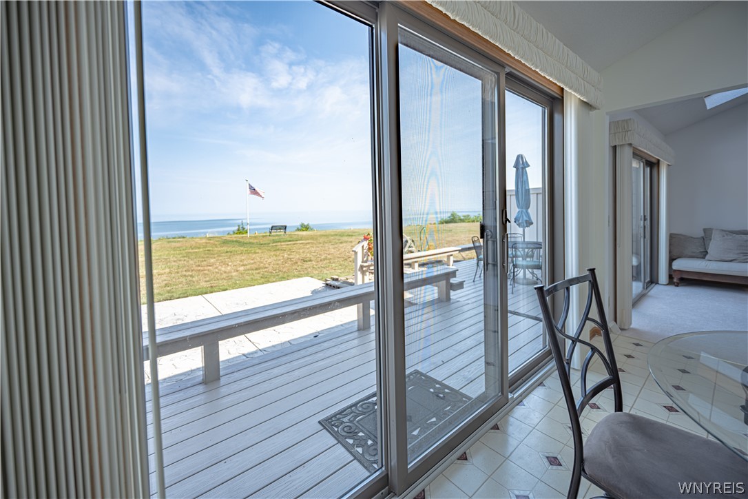 6071 East Lake Road, Unit 4 Newfane, NY 14028 - Photo 17 of 46 Sliding glass doors, maintenance free decking