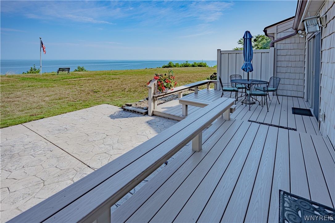6071 East Lake Road, Unit 4 Newfane, NY 14028 - Photo 36 of 46 Stamped concrete patio and maintenance free deckin