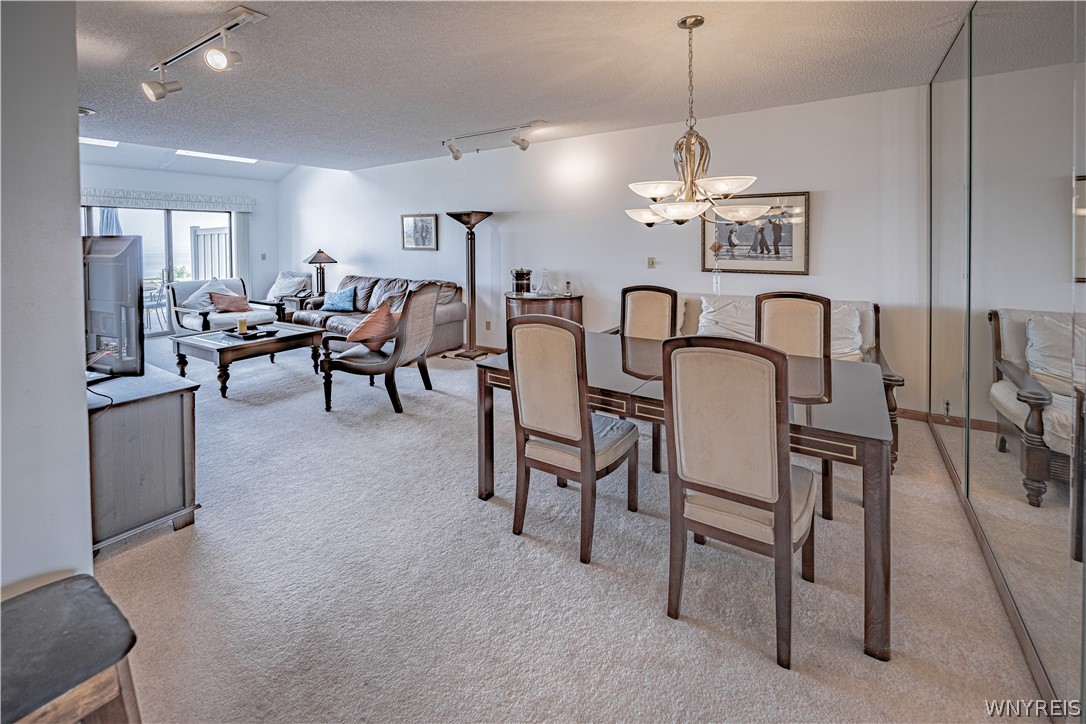 6071 East Lake Road, Unit 4 Newfane, NY 14028 - Photo 7 of 46 Living room and dining area