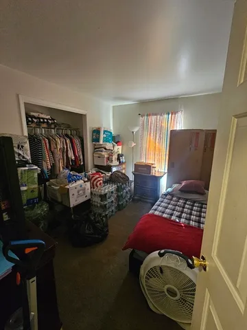 a view of a livingroom with furniture and windows