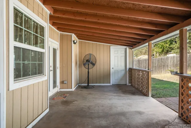 a house view with a backyard space
