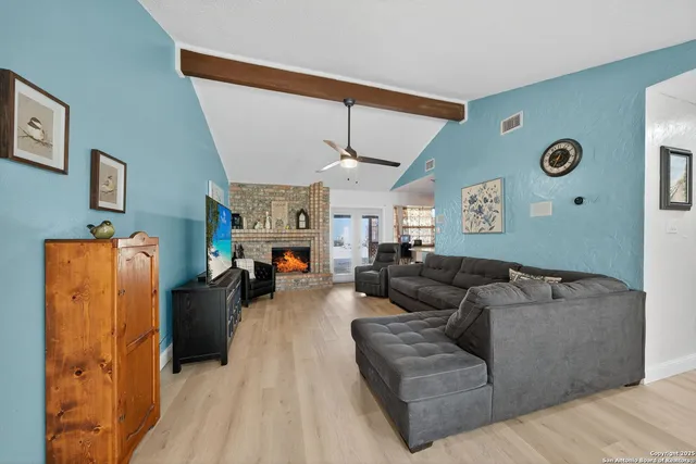 a living room with furniture and a couch