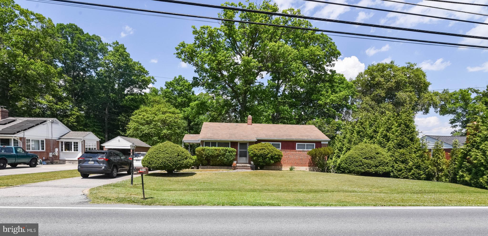 4428 Forge Road Perry Hall, MD 21128 - Photo 27 of 27 a front view of a house with garden