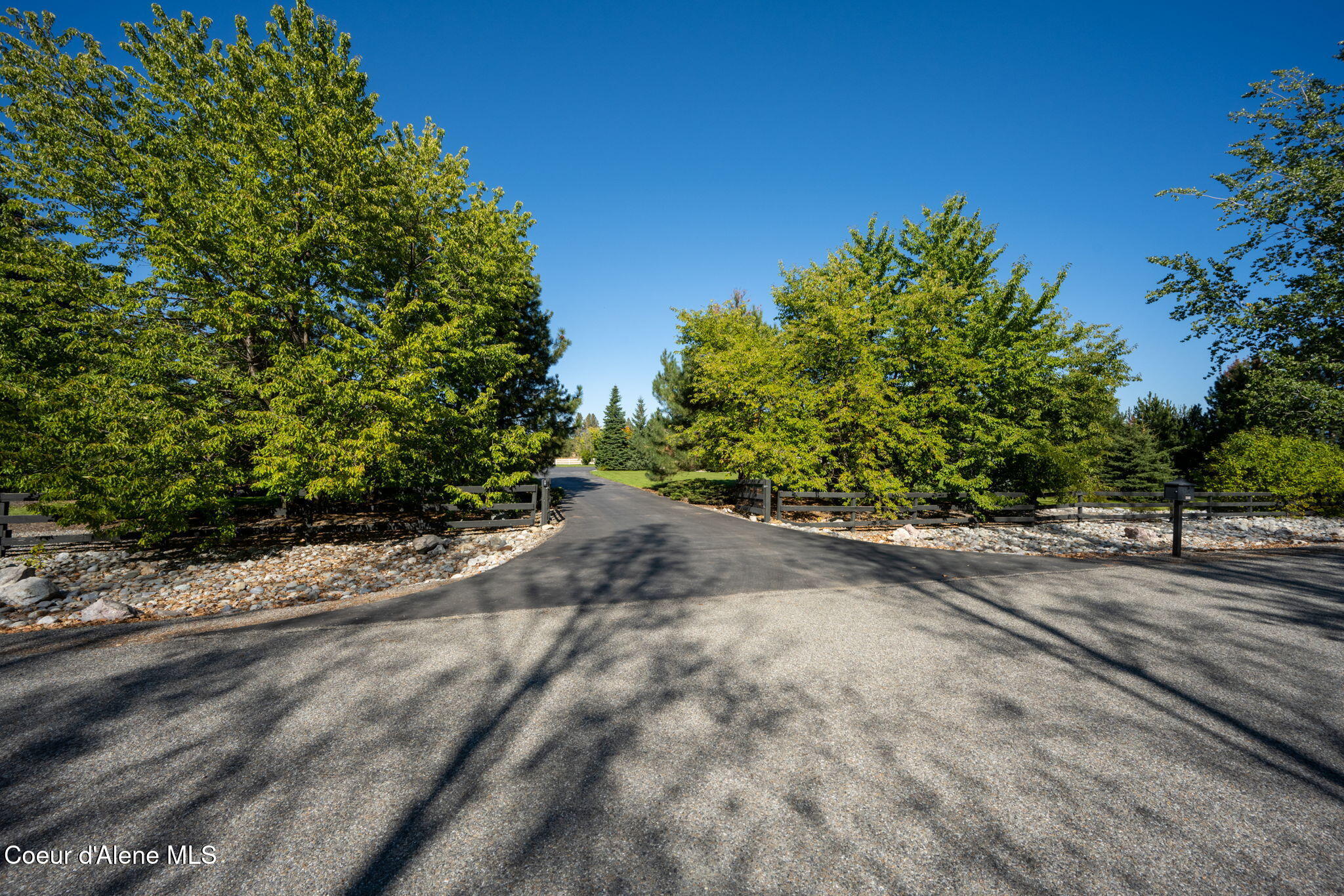 2591 West Diamond Bar Road Rathdrum, ID 83858 - Photo 8 of 41 Gated Driveway