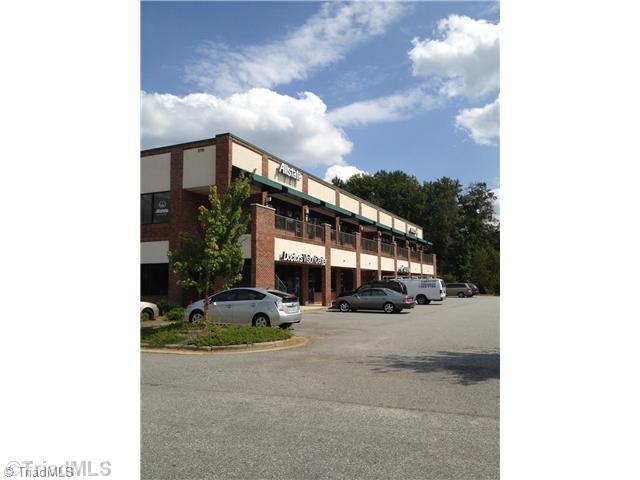 5709 High Point Road, Unit 203 Greensboro, NC 27407 - Photo 1 of 1 Exterior Front. Unit 203. 2nd level. 5 offices w/Reception area Carpet. Elevator and stairs for access.