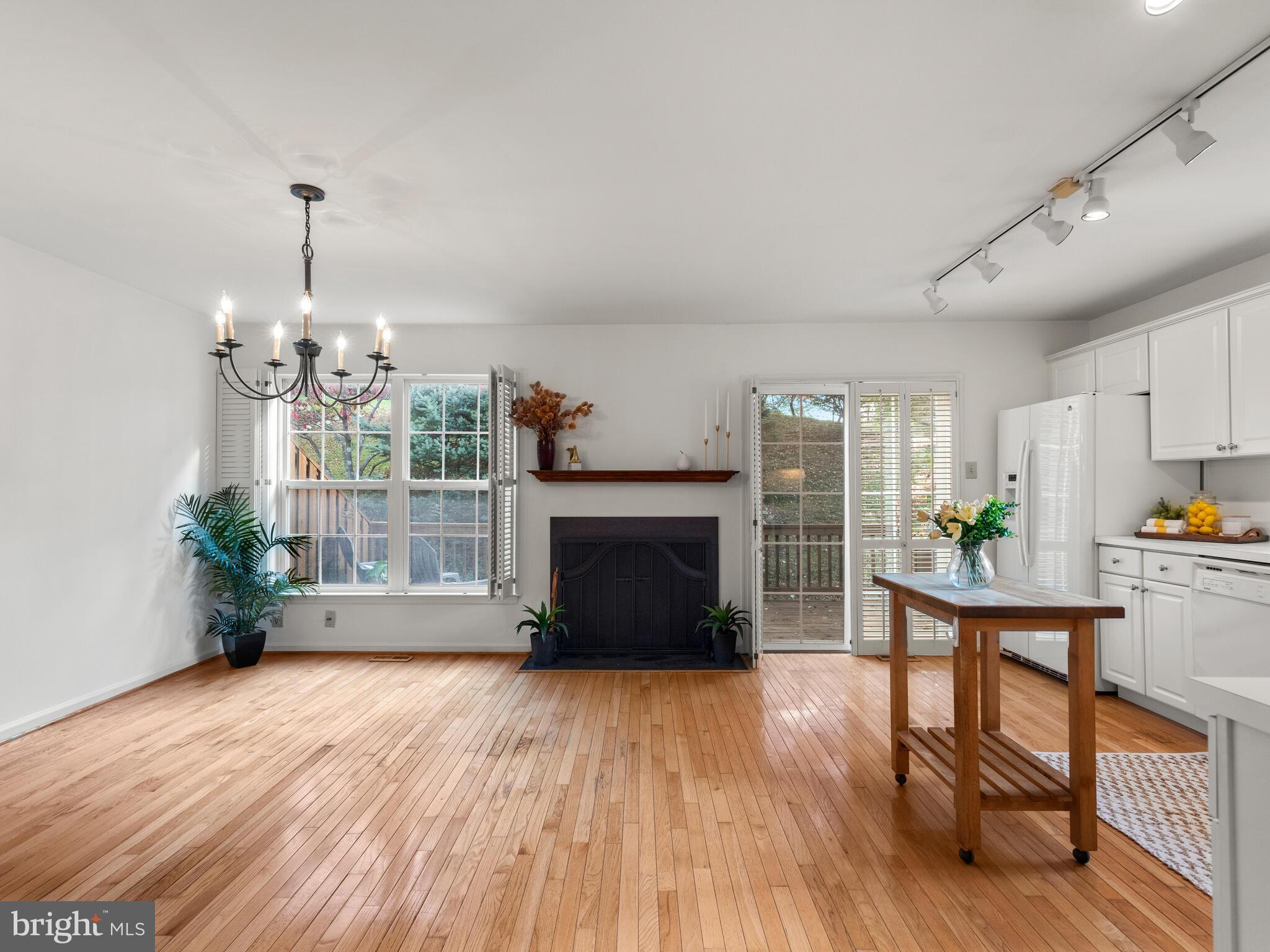913 Harbour Ridge Lane Downingtown, PA 19335 - Photo 12 of 33 a living room with furniture and a fireplace