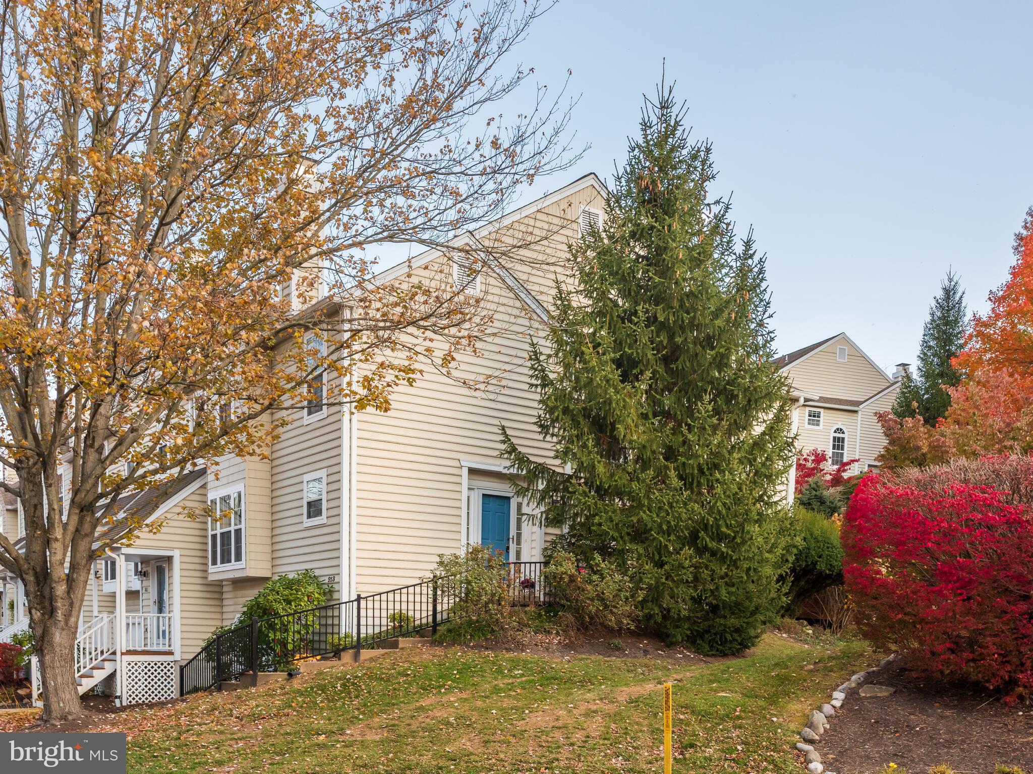 913 Harbour Ridge Lane Downingtown, PA 19335 - Photo 2 of 33 a front view of a house with garden