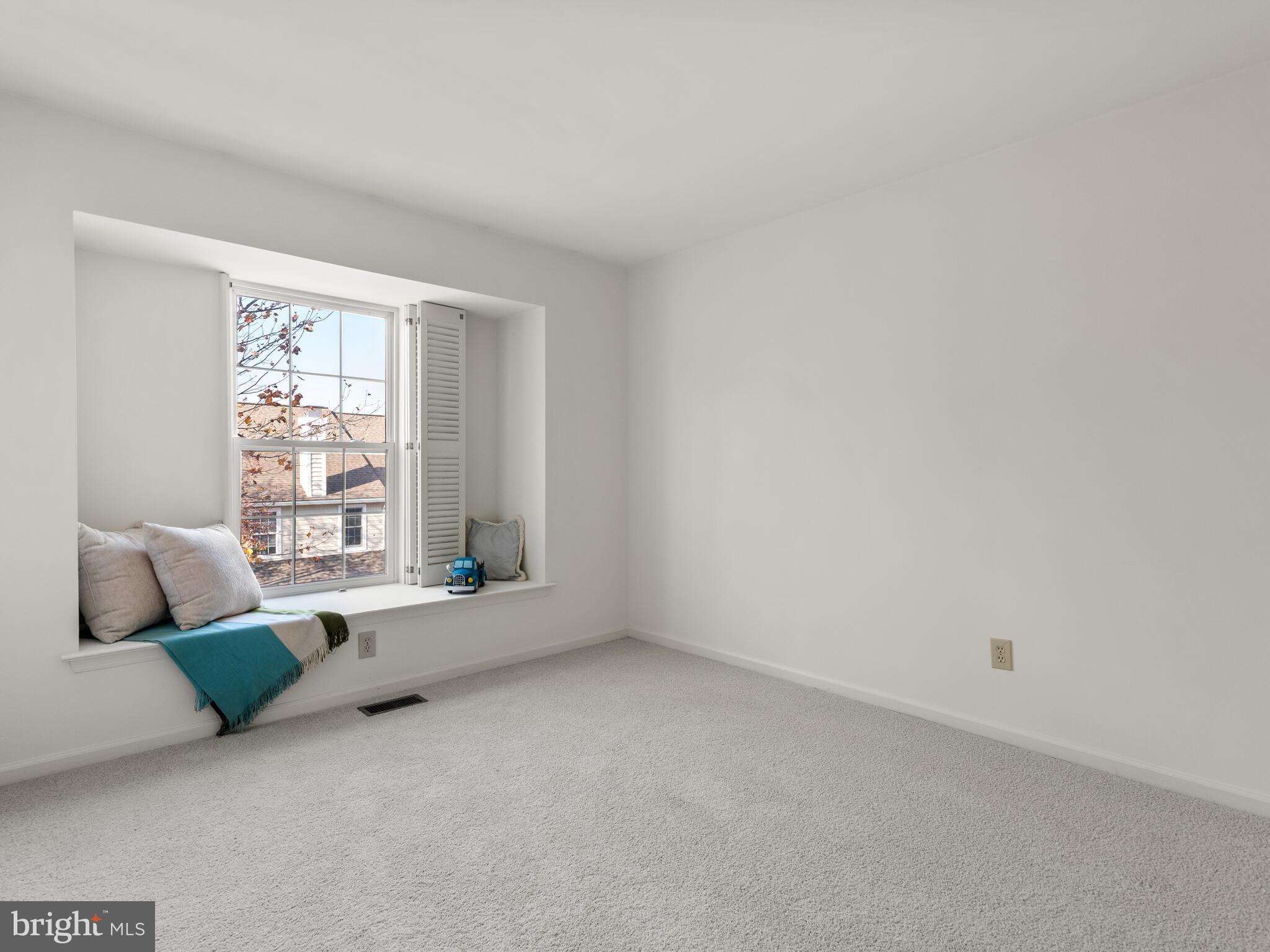 913 Harbour Ridge Lane Downingtown, PA 19335 - Photo 21 of 33 a living room with furniture and a window
