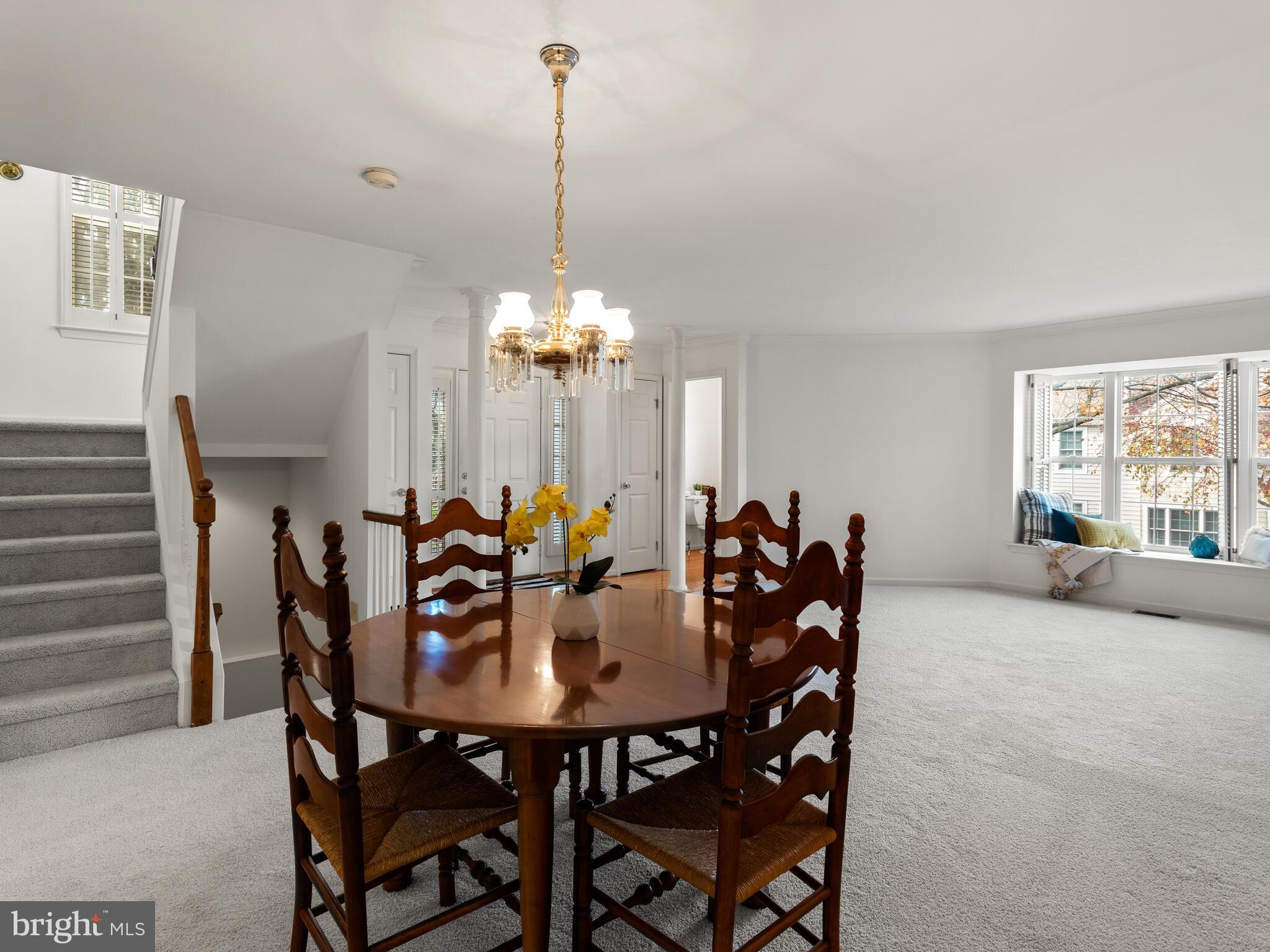 913 Harbour Ridge Lane Downingtown, PA 19335 - Photo 10 of 33 a view of a dining room and chandelier