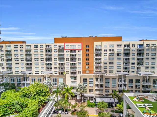 a view of a city with tall buildings