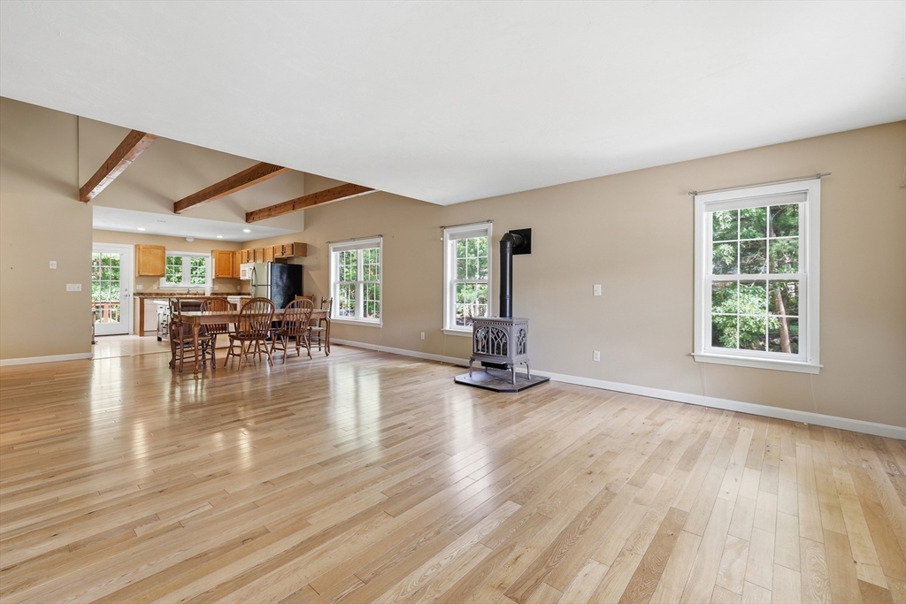 9 Rock Marsh Road, Unit B Wareham, MA 02571 - Photo 9 of 41 a view of dining room with furniture window and wooden floor