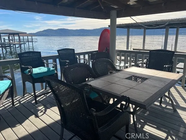 a dinning table and chairs in the patio