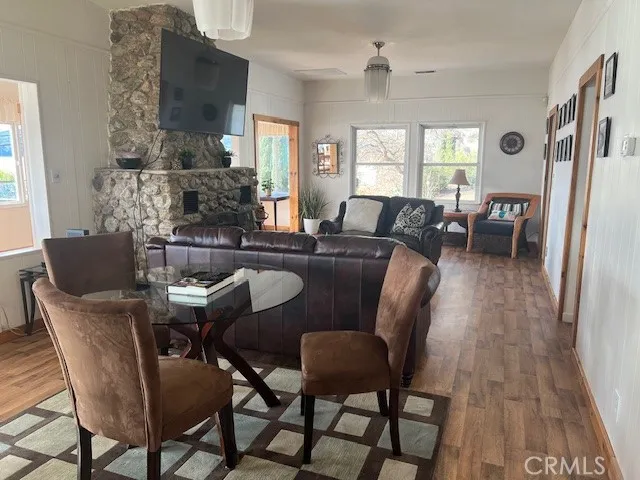 a bedroom with a bed mirror and window