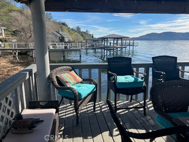 a view of a dining room with furniture and window