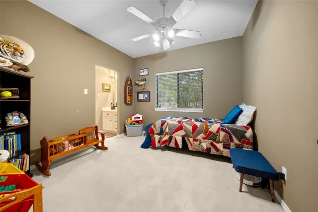 a bedroom with furniture and window