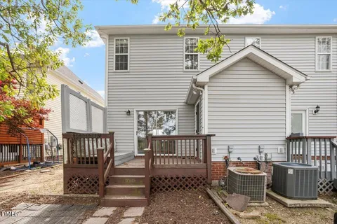 a view of a deck with furniture