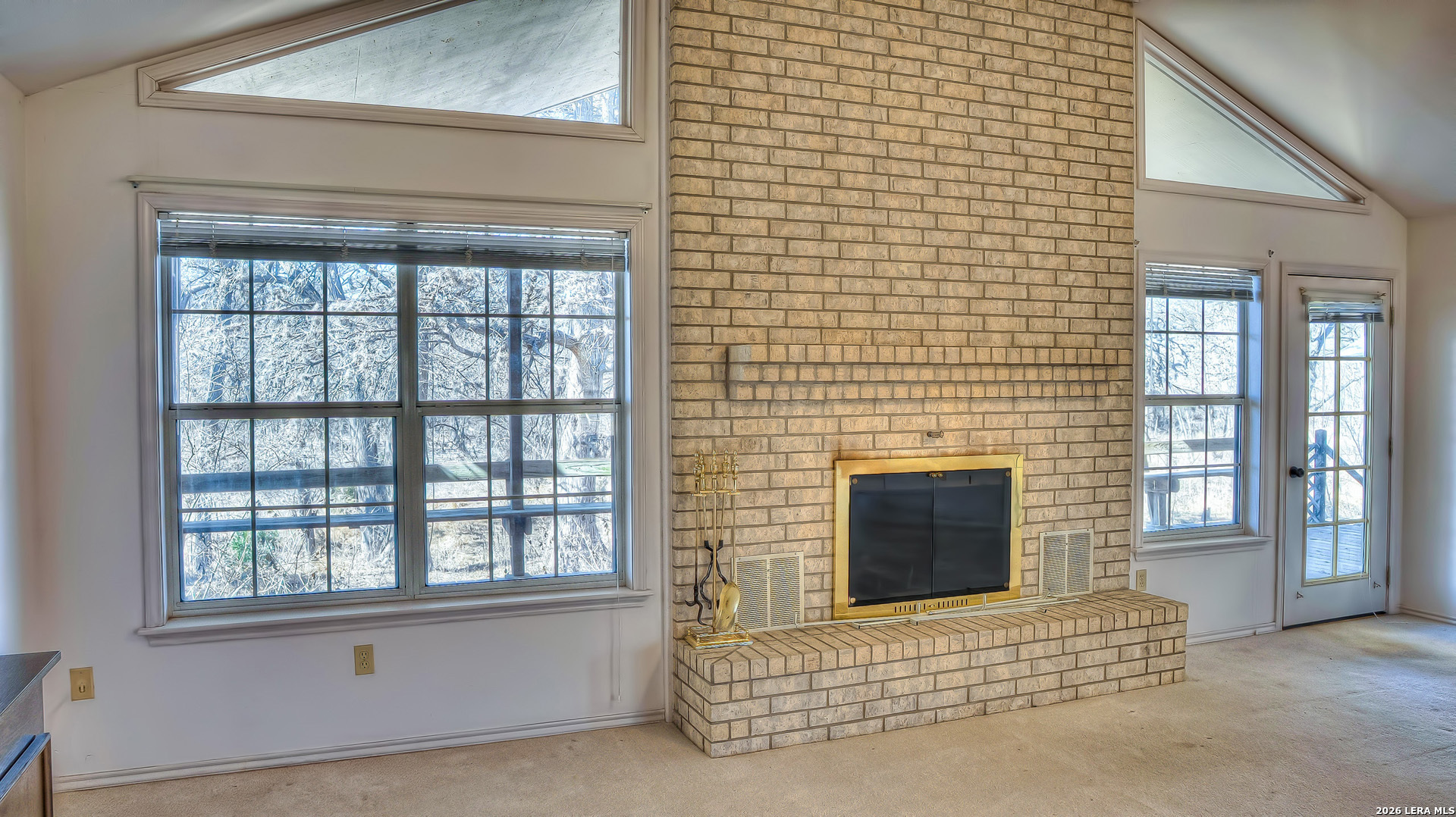 196 Canal Cir Drive Rio Frio, TX 78879 - Photo 25 of 56 a living room with furniture and a fireplace