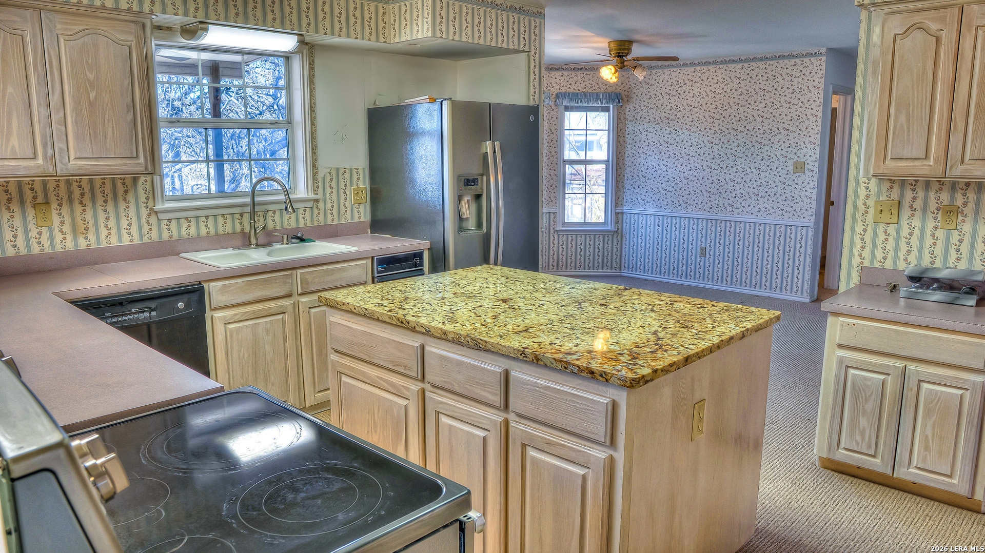 196 Canal Cir Drive Rio Frio, TX 78879 - Photo 28 of 56 a kitchen with stainless steel appliances granite countertop a sink stove and cabinets