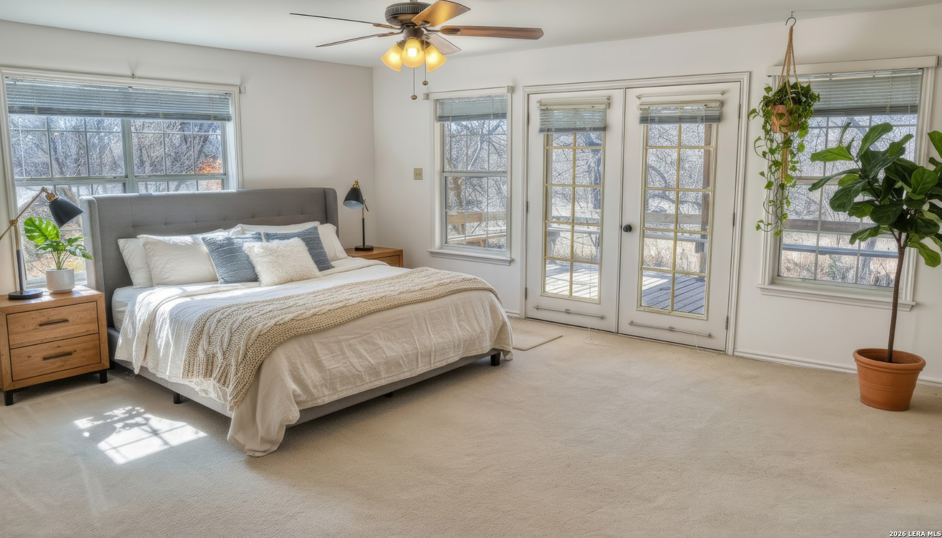 196 Canal Cir Drive Rio Frio, TX 78879 - Photo 43 of 56 a bedroom with a bed and a chandelier