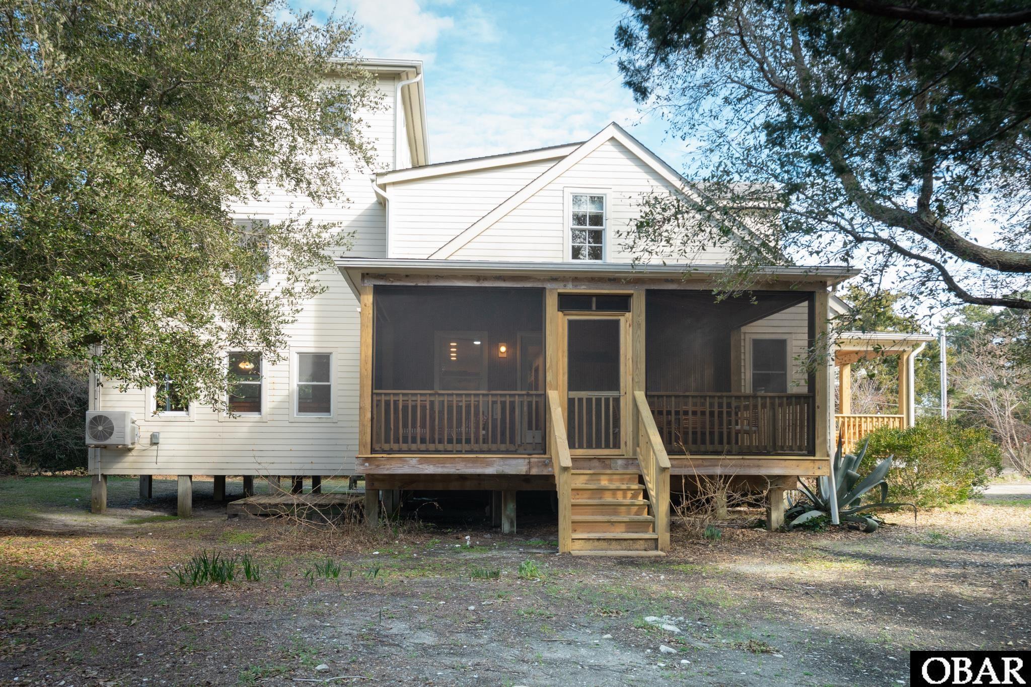 140 Lighthouse Road Ocracoke, NC 27960 - Photo 36 of 40 Side Screen Porch