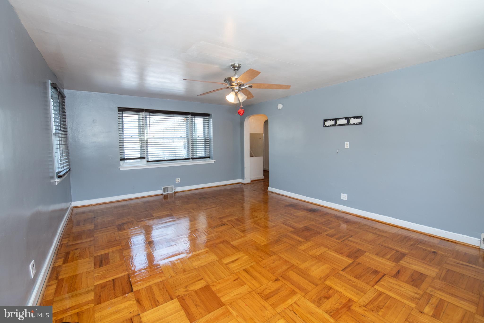 7820 Haines Road Cheltenham, PA 19012 - Photo 16 of 51 wooden floor in an empty room with a window