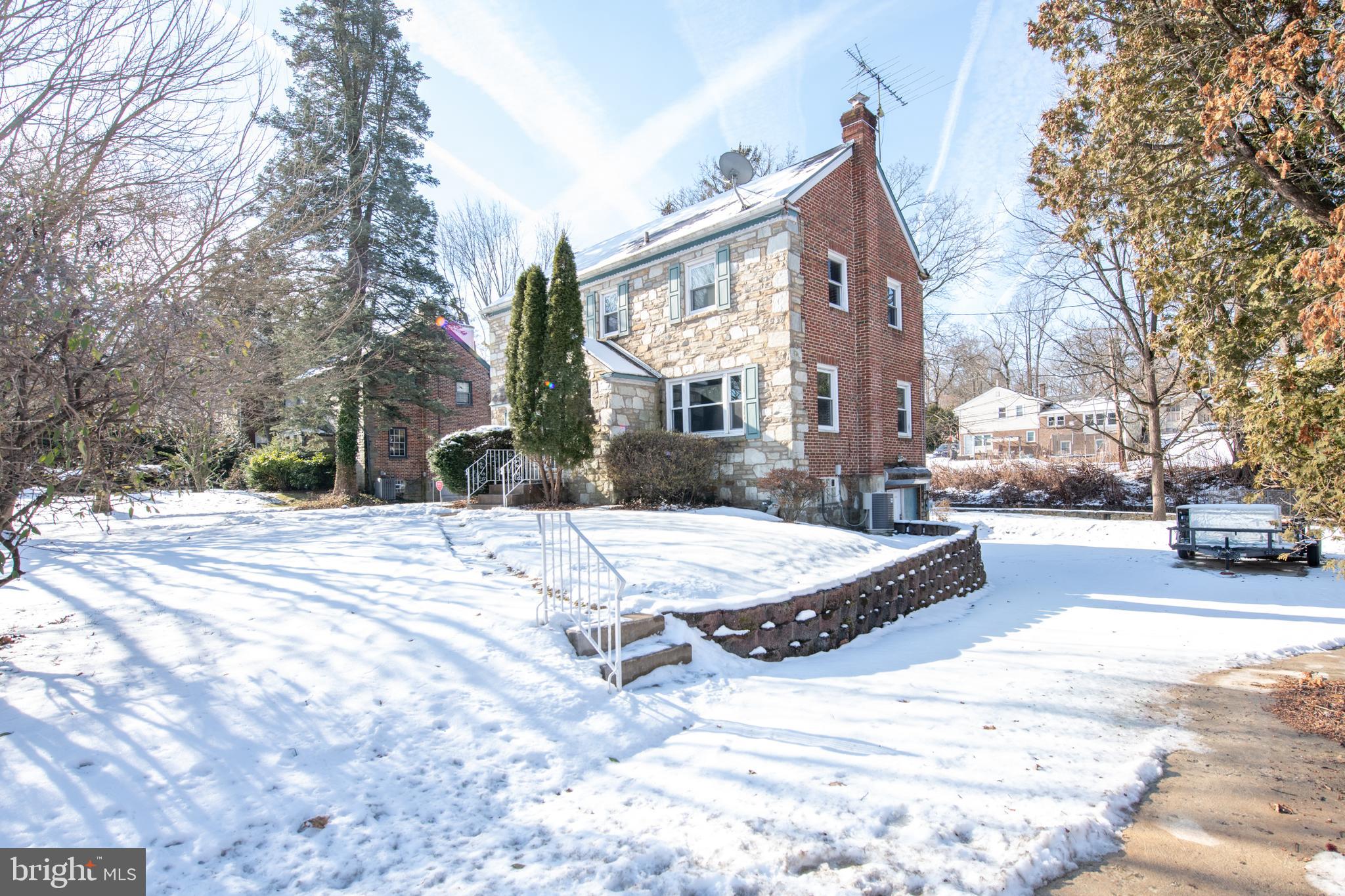 7820 Haines Road Cheltenham, PA 19012 - Photo 4 of 51 a view of a building with snow on the road