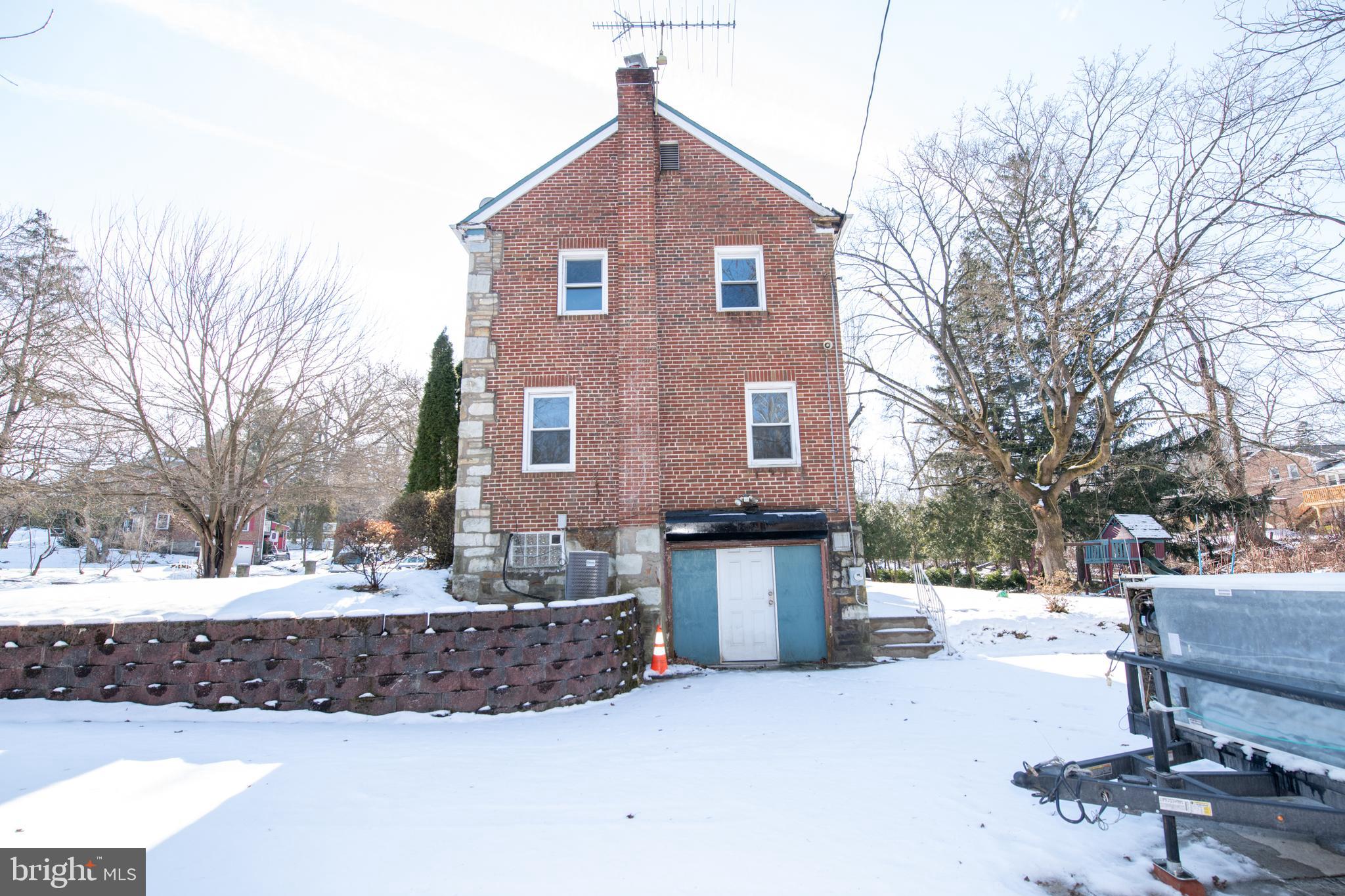 7820 Haines Road Cheltenham, PA 19012 - Photo 47 of 51 a front view of a house with a yard