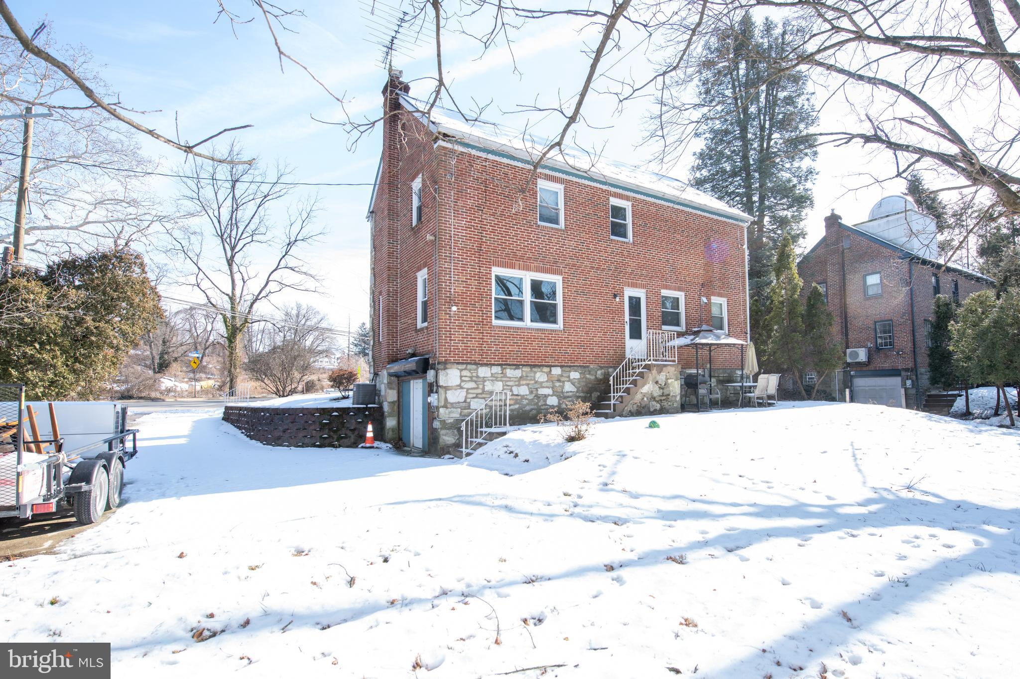7820 Haines Road Cheltenham, PA 19012 - Photo 49 of 51 a view of a house covered in snow