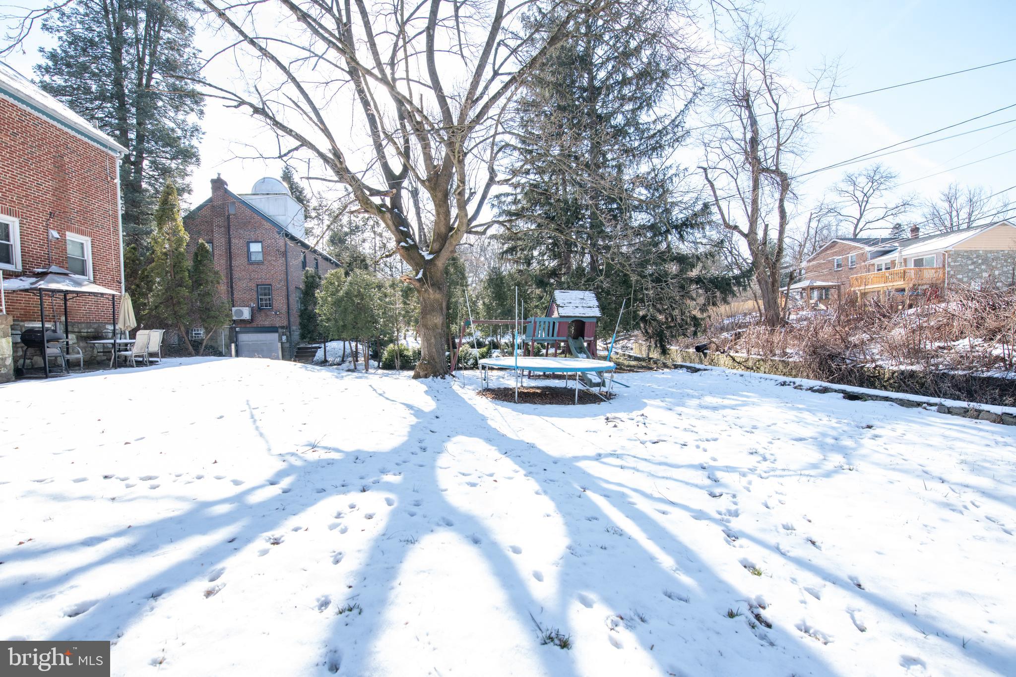 7820 Haines Road Cheltenham, PA 19012 - Photo 50 of 51 a street view covered with snow