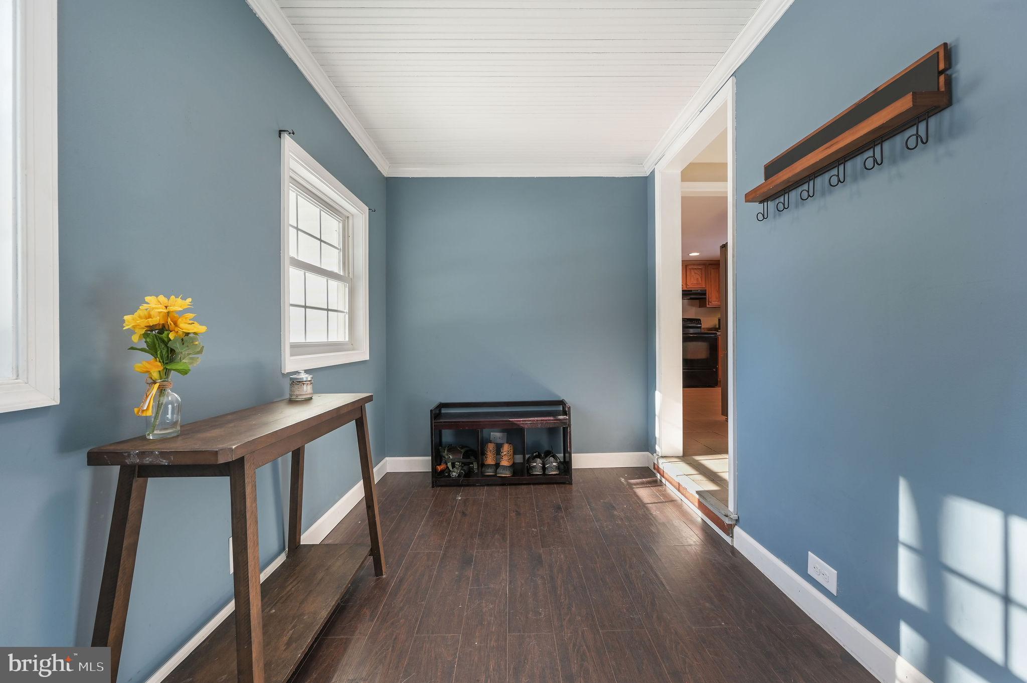 12739 Greensboro Road Greensboro, MD 21639 - Photo 13 of 28 a living room with furniture and a window