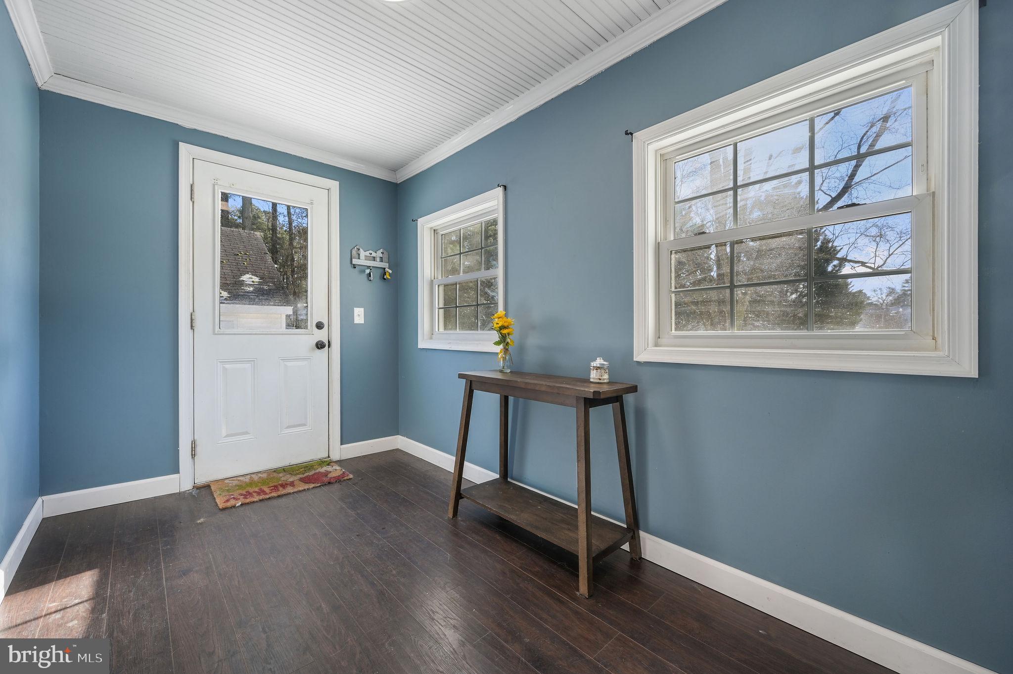 12739 Greensboro Road Greensboro, MD 21639 - Photo 14 of 28 a workspace room with furniture and windows