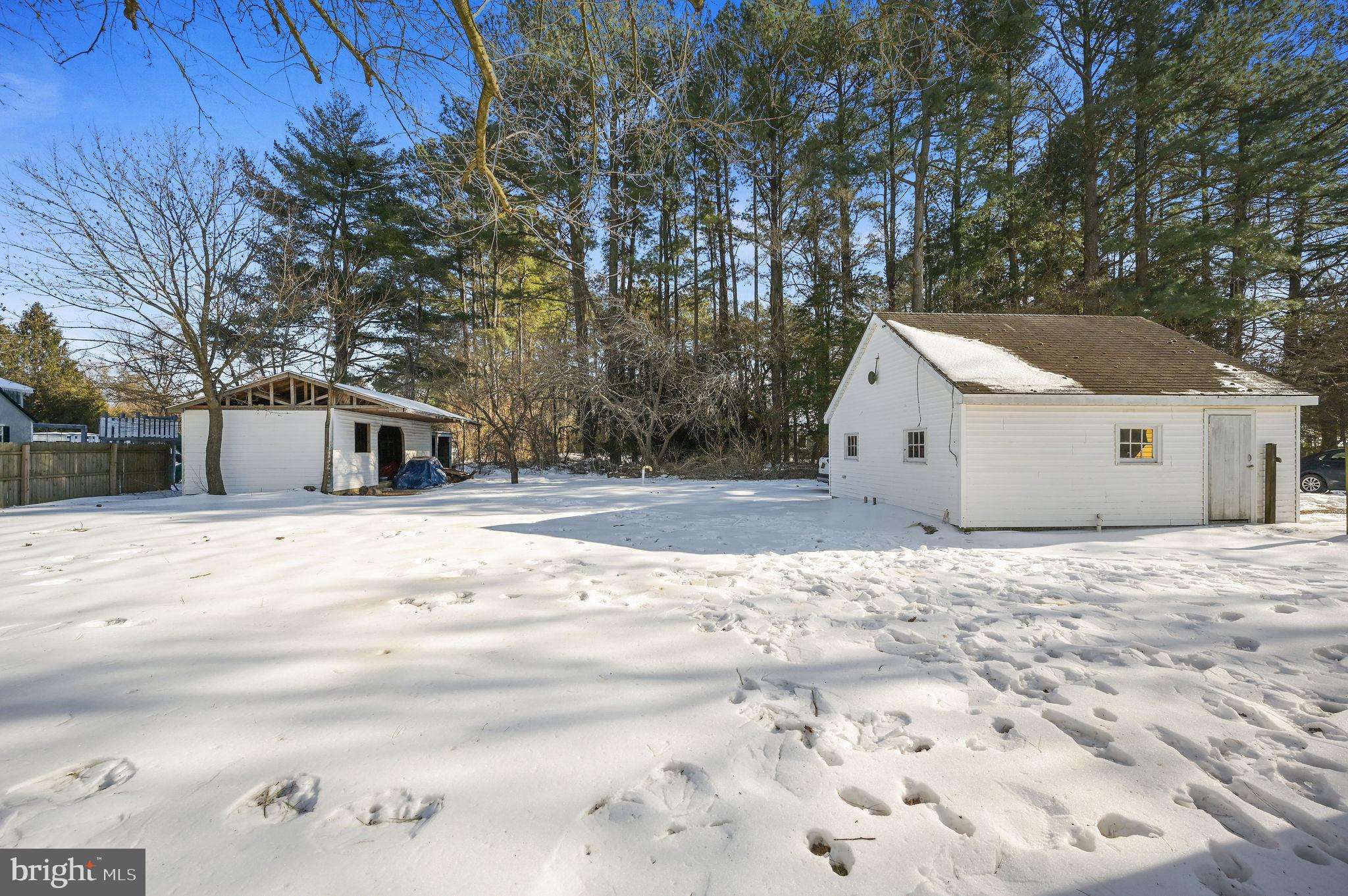12739 Greensboro Road Greensboro, MD 21639 - Photo 4 of 28 a view of white house with a snow on the road