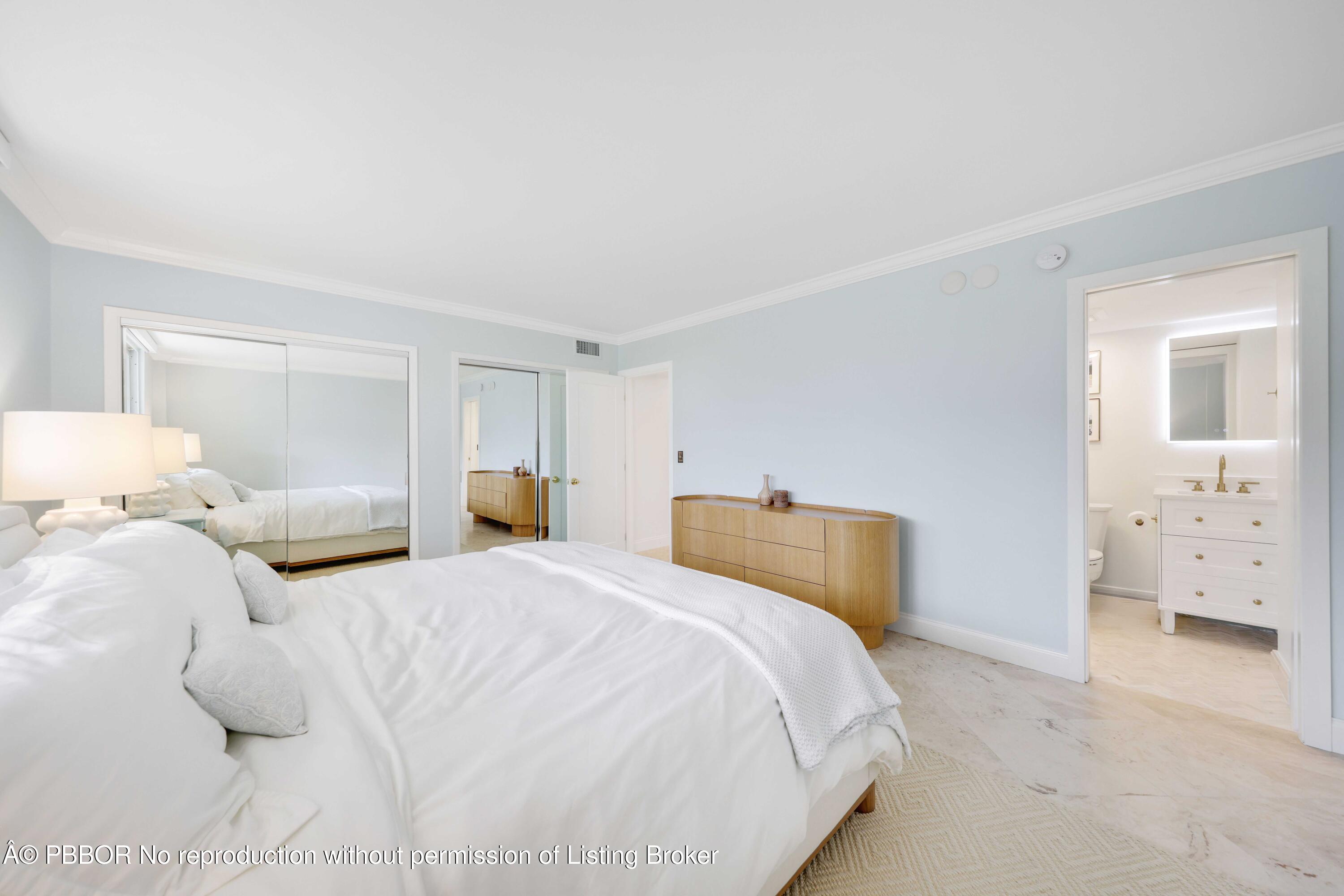 Undisclosed Address Palm Beach, FL 33480 - Photo 17 of 43 a bedroom with a bed and a walk in closet