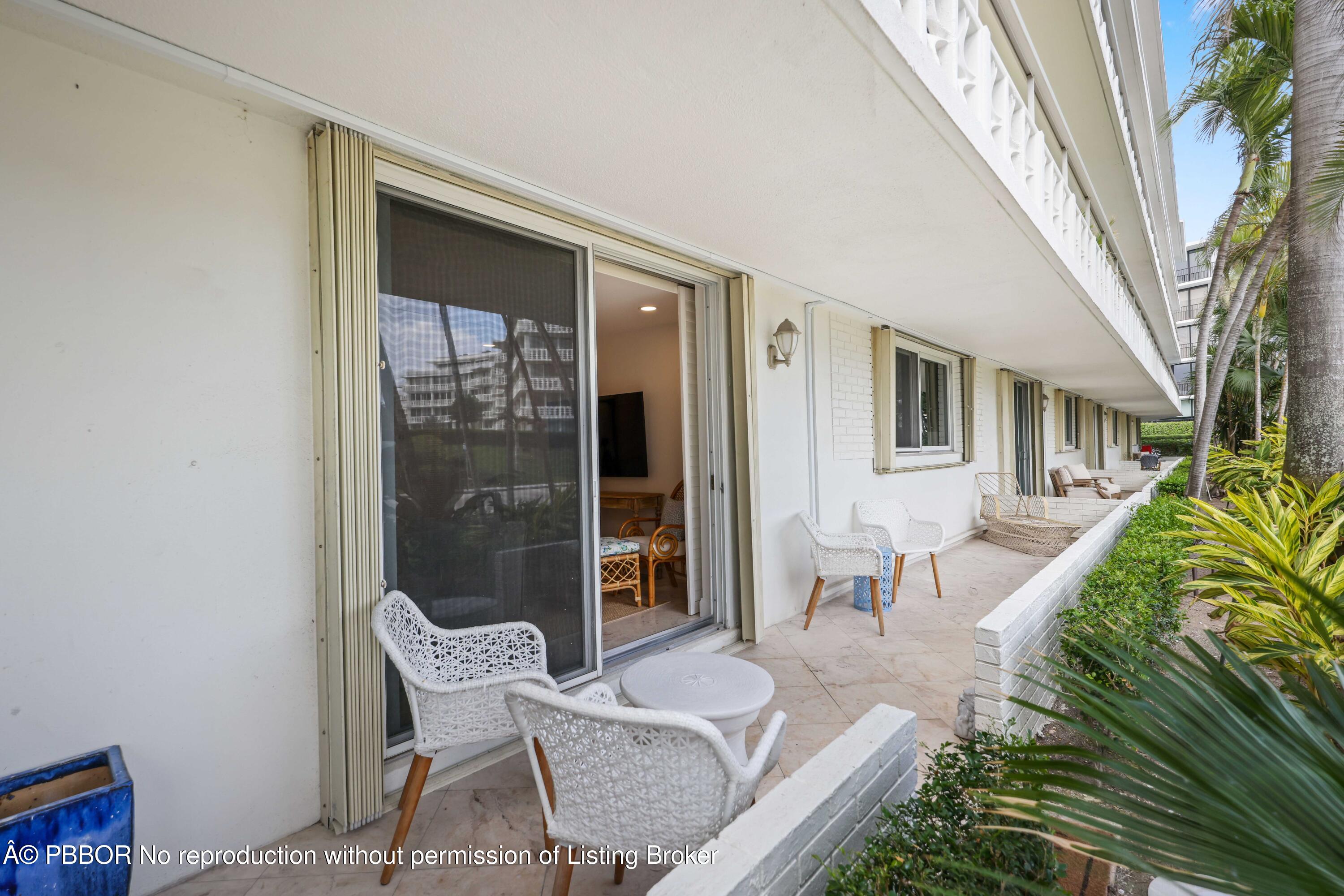 Undisclosed Address Palm Beach, FL 33480 - Photo 26 of 43 a living room with furniture