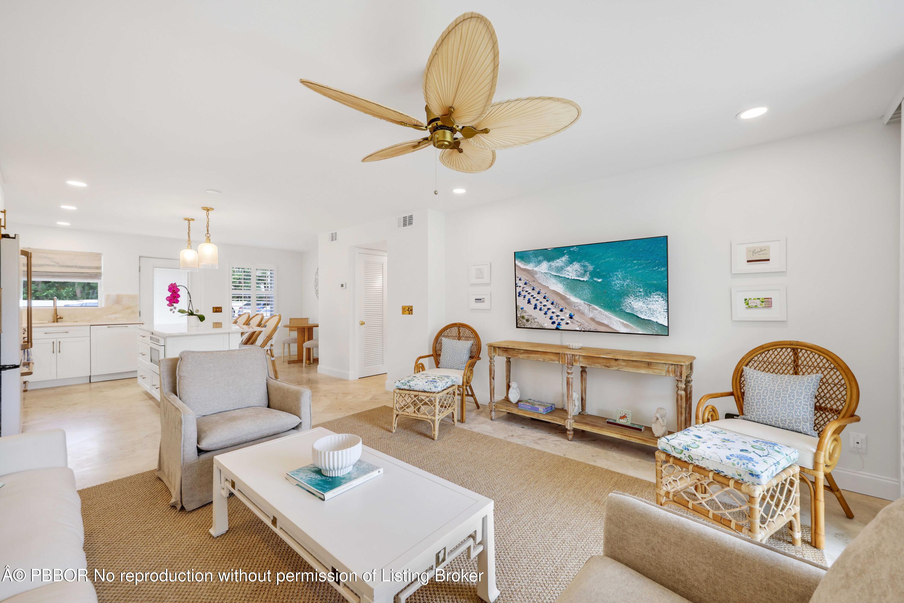 Undisclosed Address Palm Beach, FL 33480 - Photo 5 of 43 a living room with furniture and a dining table