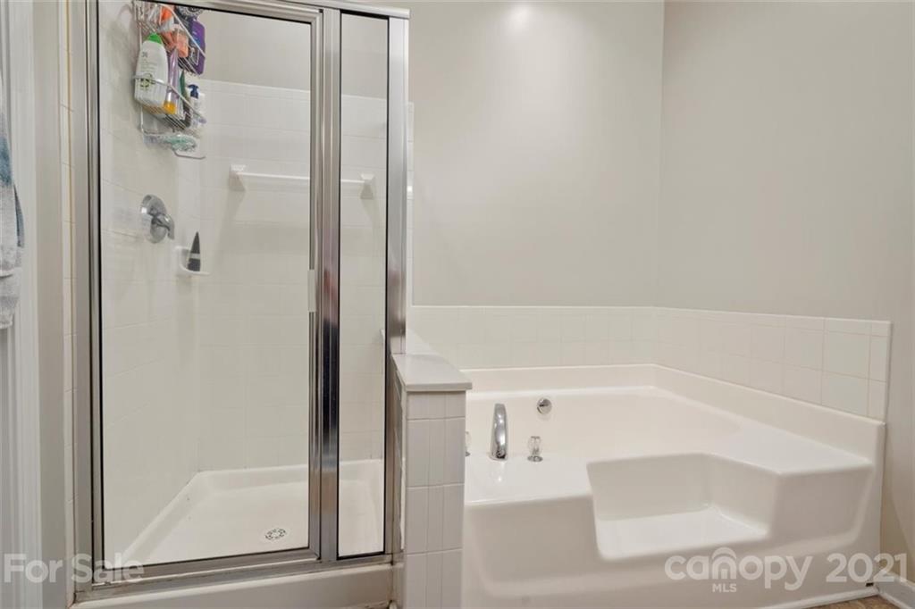 116 Snead Road, Unit 51 Fort Mill, SC 29715 - Photo 22 of 30 a bathroom with a bathtub and a shower