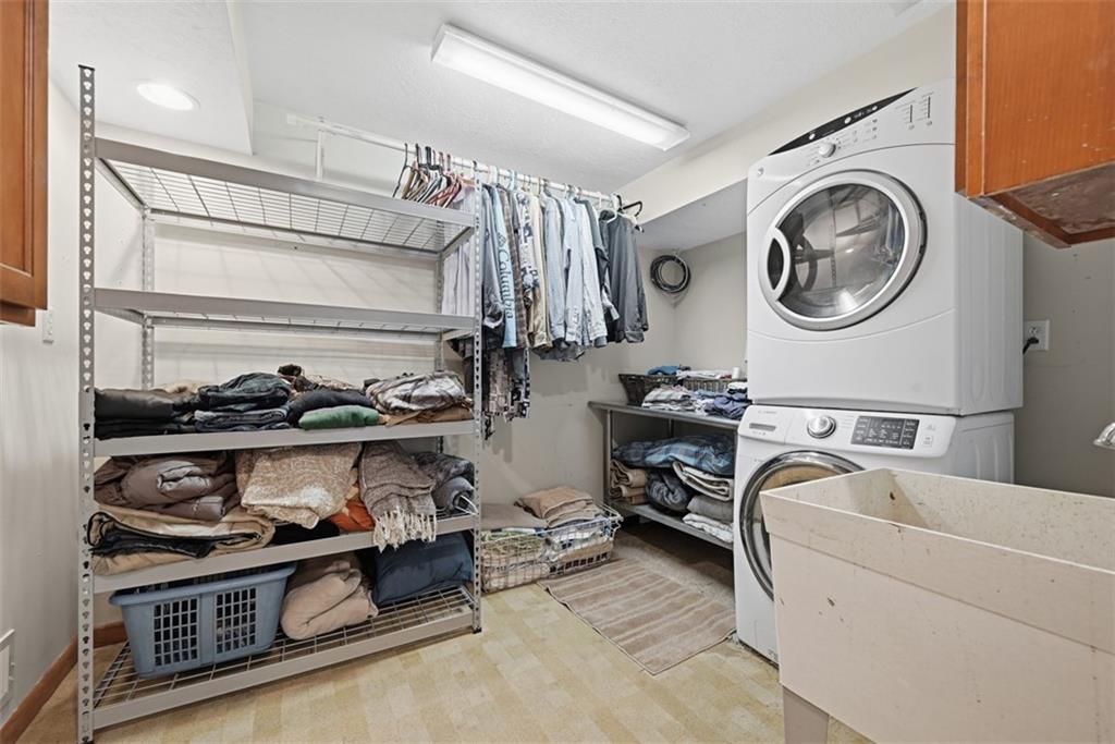 5380 Hardt Road Gibsonia, PA 15044 - Photo 35 of 49 A large laundry room allows space to hang, fold and prep laundry.