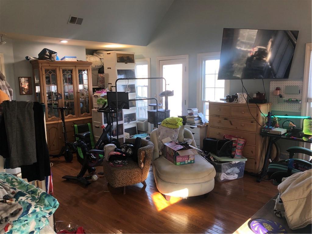 4532 High Rock Terrace Marietta, GA 30066 - Photo 11 of 40 a room with lots of furniture and clutter